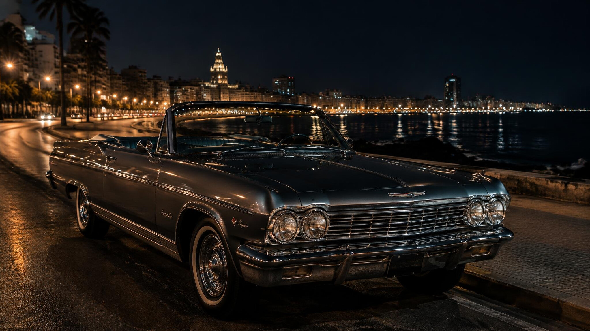 Classic convertible parked on the Rambla of Montevideo at night